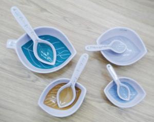 ceramic measuring cup with spoon